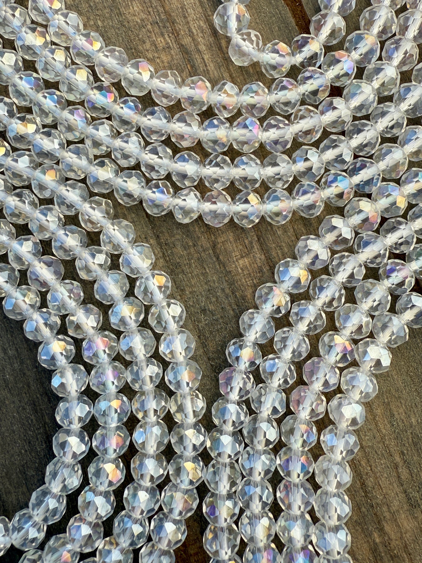 Iridescent clear crystal waist beads with faceted shine, handcrafted by Sia Body Beads for elegant body jewelry.